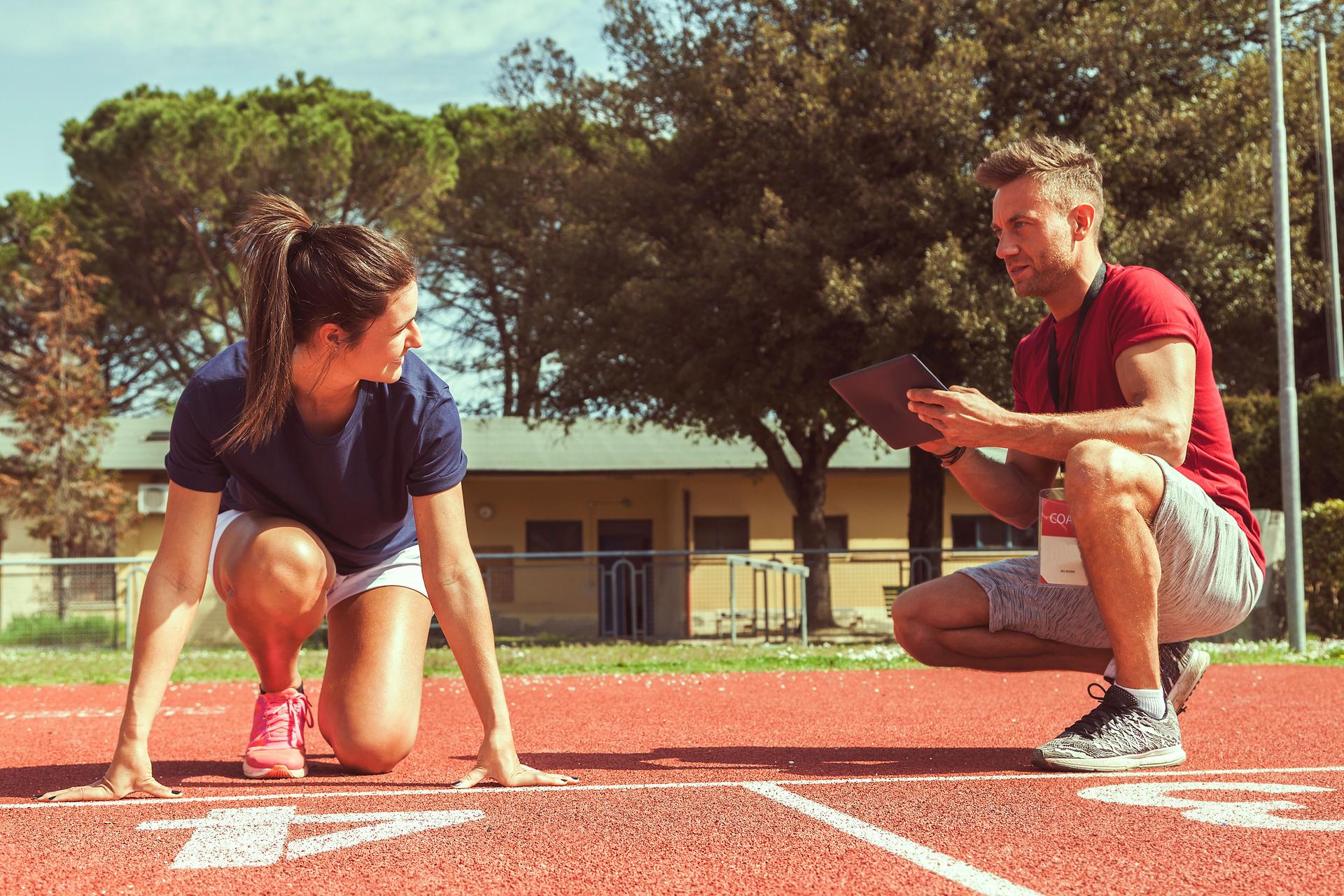 the coach times and gives tips for the ride to his young runner